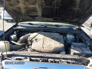 2015 Toyota Tacoma with VIN 3TMLU4EN1FM167938, listed as a IAAI auction lot 42349196 with 150,865 mi miles and . Bid and sale history available at DreamBid. Image 10.