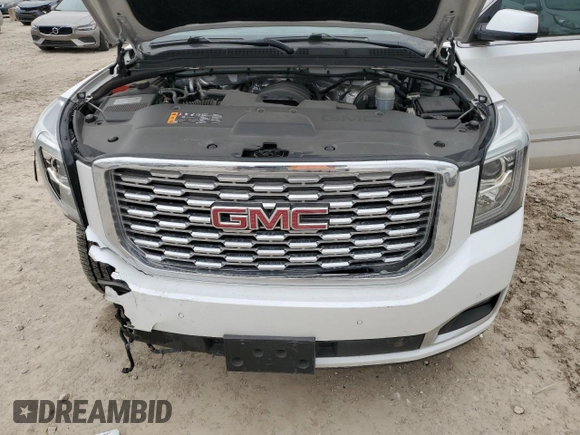 2018 GMC Yukon Denali with VIN 1GKS2CKJ4JR334480, listed as a Copart auction lot 47034435 with 84,787 mi miles and Salvage Title. Bid and sale history available at carsss.com. Image 12.