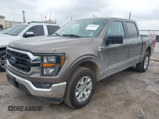 2023 Ford F-150 XL with VIN 1FTFW1E81PFB71702, listed as a IAAI auction lot 42102699 with 57,007 mi miles. Bid and sale history available at carsss.com. Image 17.