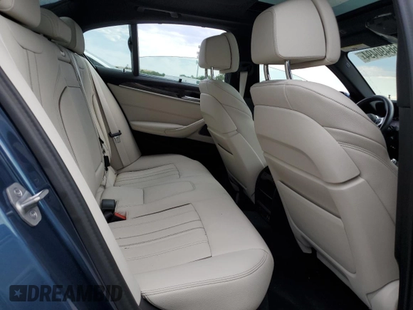 2023 BMW 5 Series M550i xDrive with VIN WBA13BK06PCM31937, listed as a Copart auction lot 66490494 with 24,972 mi miles and Salvage title. Bid and sale history available at DreamBid. Image 10.