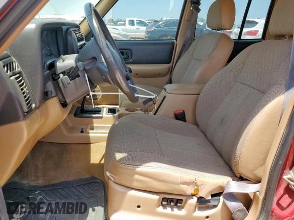 1999 Jeep Cherokee Sport с VIN 1J4FT68S5XL675839, выставлен на аукционе Copart как лот 65230005 с пробегом 204 102 миль миль и Списание • Salvage title. История ставок и продаж доступна на DreamBid. Изображение 7.