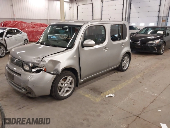 2009 Nissan Cube 1.8 SL with VIN JN8AZ28RX9T121918, listed as a IAAI auction lot 41517261 with 104,332 mi miles. Bid and sale history available at carsss.com. Image 2.