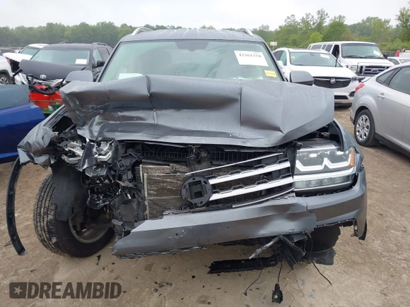 2018 Volkswagen Atlas SE z VIN 1V2KR2CAXJC517240, wystawiony jako IAAI lot #42361370 z przebiegiem 129 546 mil mil oraz . Historia ofert i sprzedaży dostępna na DreamBid. Obrazek 6.