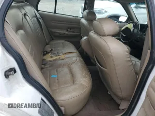 2000 Ford Crown Victoria LX z VIN 2FAFP74W4YX120352, wystawiony jako Copart lot #79833264 z przebiegiem Nie podano mil oraz Szkoda całkowita • Salvage title. Historia ofert i sprzedaży dostępna na DreamBid. Obrazek 10.