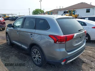 2016 Mitsubishi Outlander SE z VIN JA4AZ3A3XGZ049548, wystawiony jako IAAI lot #42393429 z przebiegiem 74 218 mil mil oraz . Historia ofert i sprzedaży dostępna na DreamBid. Obrazek 3.