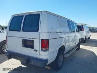 2013 Ford Econoline Cargo Van Commercial with VIN 1FTNE2EW0DDA54574, listed as a IAAI auction lot 41830505 with 127,414 mi miles. Bid and sale history available at carsss.com. Image 4.