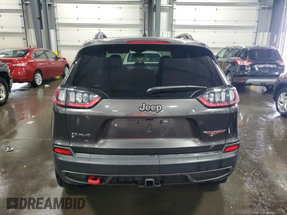 2020 Jeep Cherokee Trailhawk with VIN 1C4PJMBX9LD582951, listed as a Copart auction lot 60152935 with 61,448 mi miles and Salvage title. Bid and sale history available at DreamBid. Image 6.