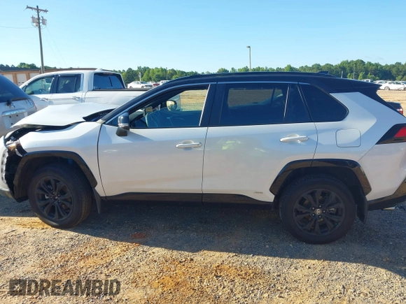 2023 Toyota RAV4 Hybrid XSE with VIN 2T3E6RFV1PW038080, listed as a IAAI auction lot 42518107 with 14,430 mi miles and . Bid and sale history available at DreamBid. Image 14.