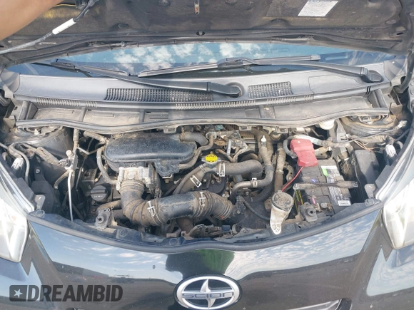 2013 Scion iQ with VIN JTNJJXB04DJ024322, listed as a IAAI auction lot 42618525 with 154,559 mi miles and . Bid and sale history available at DreamBid. Image 10.