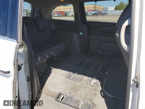 2015 Honda Odyssey Touring Elite with VIN 5FNRL5H92FB504977, listed as a Copart auction lot 56657195 with 189,438 mi miles and Salvage title. Bid and sale history available at DreamBid. Image 11.