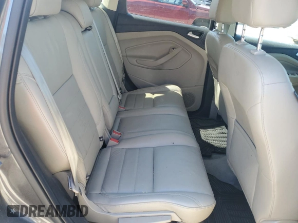 2015 Ford Escape Titanium with VIN 1FMCU9J92FUC74879, listed as a Copart auction lot 54683185 with 143,436 mi miles and Salvage title. Bid and sale history available at DreamBid. Image 11.