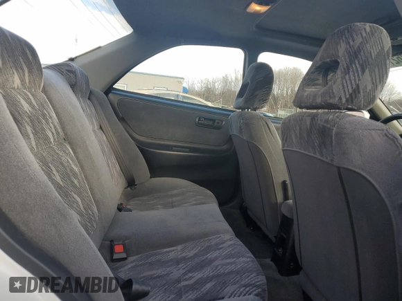 2001 Acura Integra LS z VIN JH4DB76591S000266, wystawiony jako Copart lot #86274434 z przebiegiem 33 781 mil mil oraz Szkoda całkowita • Salvage title. Historia ofert i sprzedaży dostępna na DreamBid. Obrazek 10.