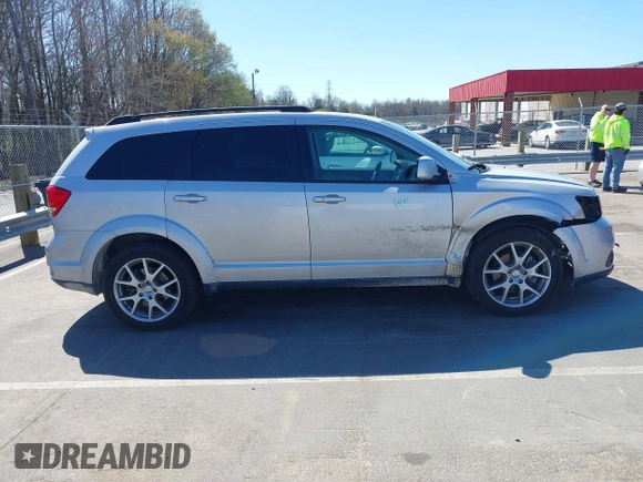 2014 Dodge Journey SXT z VIN 3C4PDCBG7ET227470, wystawiony jako IAAI lot #41843128 z przebiegiem 98 195 mil mil oraz . Historia ofert i sprzedaży dostępna na DreamBid. Obrazek 13.