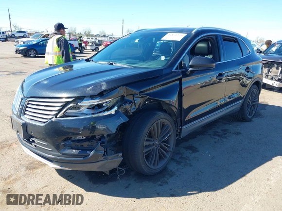 2015 Lincoln MKC with VIN 5LMTJ2AH6FUJ13505, listed as a IAAI auction lot 41871254 with 107,924 mi miles. Bid and sale history available at carsss.com. Image 2.
