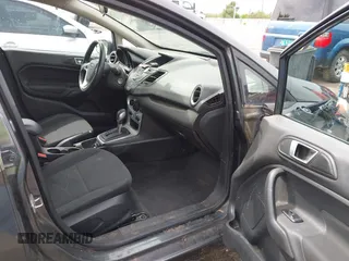2016 Ford Fiesta SE z VIN 3FADP4EJ2GM183629, wystawiony jako IAAI lot #42193199 z przebiegiem 80 653 mil mil oraz . Historia ofert i sprzedaży dostępna na DreamBid. Obrazek 5.