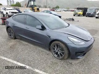 2023 Tesla Model 3 with VIN 5YJ3E1EA9PF543672, listed as a Copart auction lot 48211035 with Not Provided miles and Salvage Title. Bid and sale history available at DreamBid. Image 4.