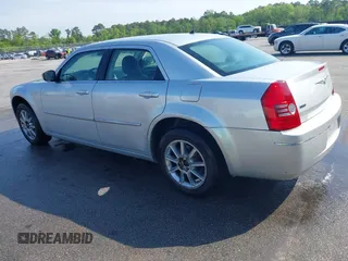 2008 Chrysler 300 Touring with VIN 2C3LK53G38H233492, listed as a IAAI auction lot 42004537 with 200,695 mi miles and . Bid and sale history available at carsss.com. Image 3.