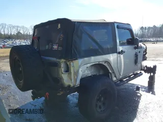 2011 Jeep Wrangler Rubicon with VIN 1J4BA6D10BL514776, listed as a IAAI auction lot 41487396 with 172,208 mi miles. Bid and sale history available at carsss.com. Image 4.