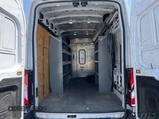2020 Ford Transit Cargo with VIN 1FTBR3X85LKB54305, listed as a IAAI auction lot 42868187 with 82,829 mi miles and . Bid and sale history available at DreamBid. Image 12.