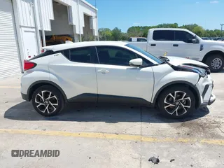 2021 Toyota C-HR LE with VIN JTNKHMBX8M1104427, listed as a IAAI auction lot 41948234 with 24,415 mi miles. Bid and sale history available at carsss.com. Image 13.