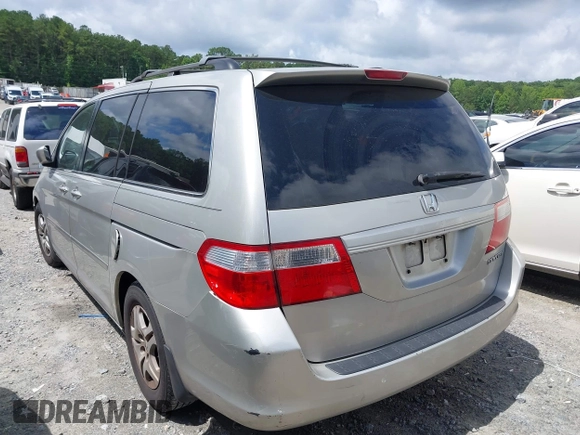 2005 Honda Odyssey EX-L with VIN 5FNRL38745B083510, listed as a IAAI auction lot 42534287 with 304,298 mi miles and . Bid and sale history available at DreamBid. Image 3.