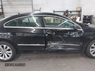 2012 Volkswagen CC Sport PZEV with VIN WVWMP7AN8CE537805, listed as a IAAI auction lot 41847051 with 147,095 mi miles. Bid and sale history available at carsss.com. Image 13.