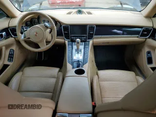 2015 Porsche Panamera S E-Hybrid z VIN WP0AD2A76FL041627, wystawiony jako Copart lot #63190924 z przebiegiem 88 860 mil mil oraz Szkody całkowita. Historia ofert i sprzedaży dostępna na DreamBid. Obrazek 8.