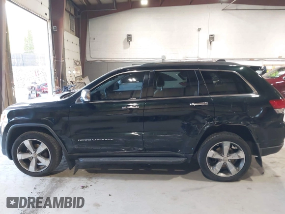 2014 Jeep Grand Cherokee Limited z VIN 1C4RJFBG2EC320282, wystawiony jako IAAI lot #42067273 z przebiegiem 78 061 mil mil oraz . Historia ofert i sprzedaży dostępna na DreamBid. Obrazek 6.