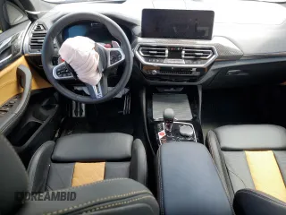 2022 BMW X4 M z VIN 5YM23EC05N9K69338, wystawiony jako Copart lot #63157463 z przebiegiem Nie podano mil oraz . Historia ofert i sprzedaży dostępna na DreamBid. Obrazek 8.