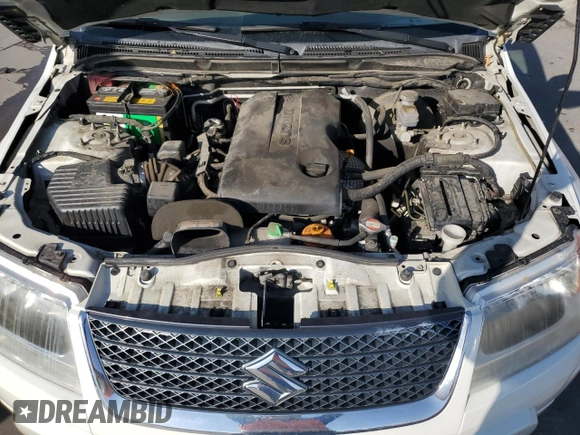 2012 Suzuki Grand Vitara Premium z VIN JS3TD0D64C4100245, wystawiony jako Copart lot #71365134 z przebiegiem 100 501 mil mil oraz Szkoda całkowita • Salvage title. Historia ofert i sprzedaży dostępna na DreamBid. Obrazek 12.