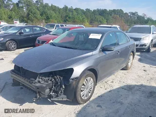 2015 Volkswagen Passat 1.8T S with VIN 1VWAT7A33FC053258, listed as a IAAI auction lot 40951558 with 137,016 mi miles. Bid and sale history available at carsss.com. Image 17.
