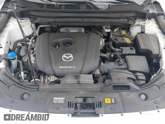 2020 Mazda CX-5 Grand Touring with VIN JM3KFBDM5L0731373, listed as a IAAI auction lot 41900567 with 31,268 mi miles and . Bid and sale history available at DreamBid. Image 10.