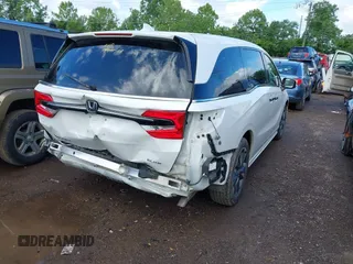 2022 Honda Odyssey Elite with VIN 5FNRL6H91NB058941, listed as a IAAI auction lot 42320293 with 30,977 mi miles and . Bid and sale history available at DreamBid. Image 4.