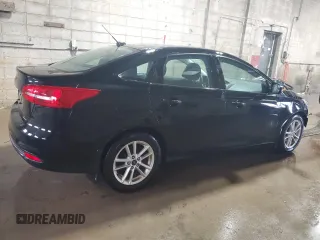 2016 Ford Focus SE with VIN 1FADP3F29GL371728, listed as a Copart auction lot 48871195 with 87,079 mi miles and Salvage Title. Bid and sale history available at carsss.com. Image 3.
