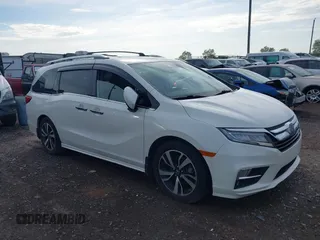 2018 Honda Odyssey Elite with VIN 5FNRL6H98JB045078, listed as a IAAI auction lot 42184758 with 144,981 mi miles. Bid and sale history available at carsss.com. Image 1.