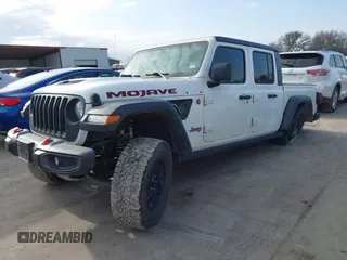 2021 Jeep Gladiator Mojave с VIN 1C6JJTEG0ML609125, выставлен на аукционе IAAI как лот 41570165 с пробегом 42 071 миль миль и . История ставок и продаж доступна на DreamBid. Изображение 2.