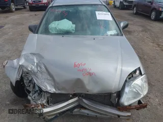 2000 Honda Civic LX with VIN 1HGEJ6670YL030749, listed as a IAAI auction lot 42112694 with 153,903 mi miles. Bid and sale history available at carsss.com. Image 12.