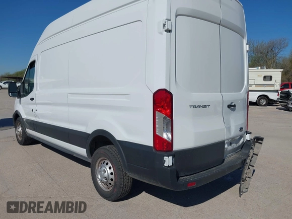 2023 Ford Transit Cargo with VIN 1FTBR2X82PKA33456, listed as a IAAI auction lot 41856428 with 54,088 mi miles and . Bid and sale history available at DreamBid. Image 3.