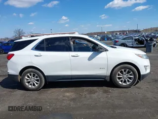 2020 Chevrolet Equinox LT z VIN 2GNAXKEV8L6141918, wystawiony jako IAAI lot #41882535 z przebiegiem 125 974 mil mil oraz . Historia ofert i sprzedaży dostępna na DreamBid. Obrazek 14.