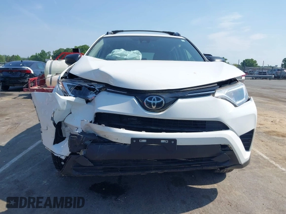2017 Toyota RAV4 LE with VIN JTMBFREV8HJ157555, listed as a IAAI auction lot 42147300 with 81,187 mi miles and . Bid and sale history available at DreamBid. Image 6.