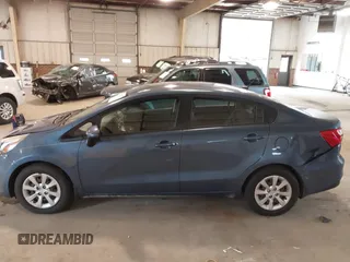 2016 Kia Rio LX with VIN KNADM4A38G6660555, listed as a IAAI auction lot 41754811 with 127,534 mi miles. Bid and sale history available at carsss.com. Image 14.