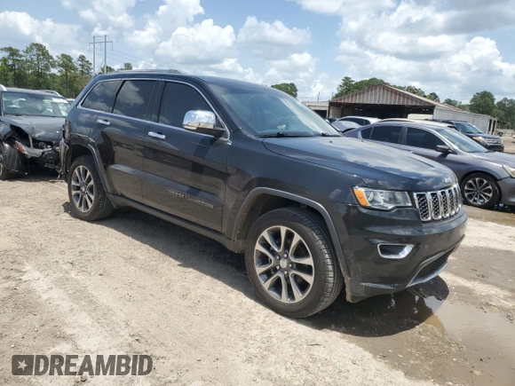 2018 Jeep Grand Cherokee Sterling z VIN 1C4RJEBG4JC241944, wystawiony jako Copart lot #61679565 z przebiegiem 83 480 mil mil oraz Szkoda całkowita • Salvage title. Historia ofert i sprzedaży dostępna na DreamBid. Obrazek 4.