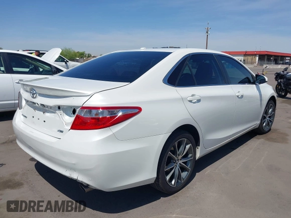 2015 Toyota Camry XLE with VIN 4T1BF1FK4FU477825, listed as a IAAI auction lot 41988429 with 156,886 mi miles and . Bid and sale history available at DreamBid. Image 4.