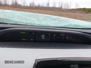 2021 Toyota Prius LE z VIN JTDL9MFU4M3028389, wystawiony jako IAAI lot #41800573 z przebiegiem 32 623 mil mil oraz . Historia ofert i sprzedaży dostępna na DreamBid. Obrazek 7.