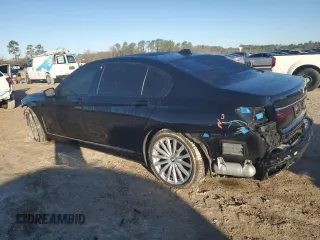 2020 BMW 7 Series 740i with VIN WBA7T2C0XLCE02429, listed as a Copart auction lot 42574835 with 73,970 mi miles and Salvage Title. Bid and sale history available at carsss.com. Image 2.