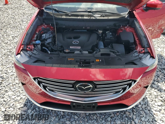 2023 Mazda CX-9 Grand Touring z VIN JM3TCBDY4P0633408, wystawiony jako Copart lot #57242685 z przebiegiem 28 859 mil mil oraz Szkoda całkowita • Salvage title. Historia ofert i sprzedaży dostępna na DreamBid. Obrazek 12.