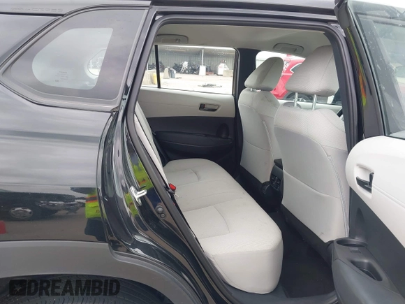 2024 Toyota Corolla Cross L with VIN 7MUAAABG0RV084192, listed as a IAAI auction lot 42137440 with 18,034 mi miles and . Bid and sale history available at DreamBid. Image 8.