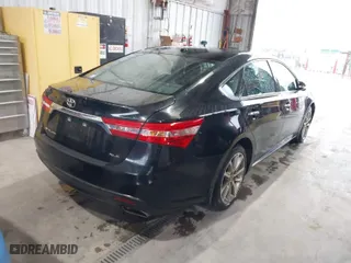 2014 Toyota Avalon Limited with VIN 4T1BK1EB0EU079880, listed as a IAAI auction lot 41557575 with 80,273 mi miles. Bid and sale history available at carsss.com. Image 4.