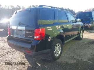 2010 Mazda Tribute Sport with VIN 4F2CY9C74AKM03679, listed as a IAAI auction lot 41740156 with 142,208 mi miles and . Bid and sale history available at DreamBid. Image 4.