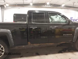2014 Chevrolet Silverado 1500 LT with VIN 1GCVKREH2EZ225509, listed as a IAAI auction lot 41728865 with 257,709 mi miles and . Bid and sale history available at DreamBid. Image 13.